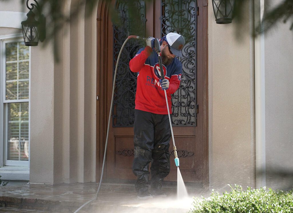pressure washing a porch